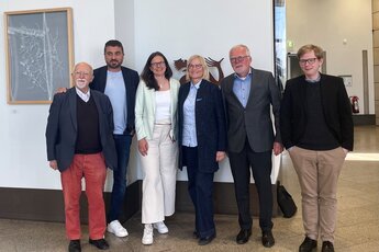 Gruppenbild der Gremienmitglieder der UNO-Flüchtlingshilfe