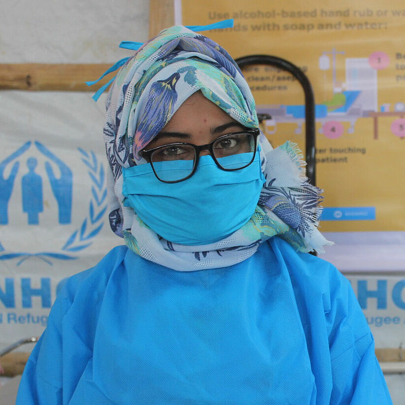 Covid, Helferin mit Maske aus Bangladesch